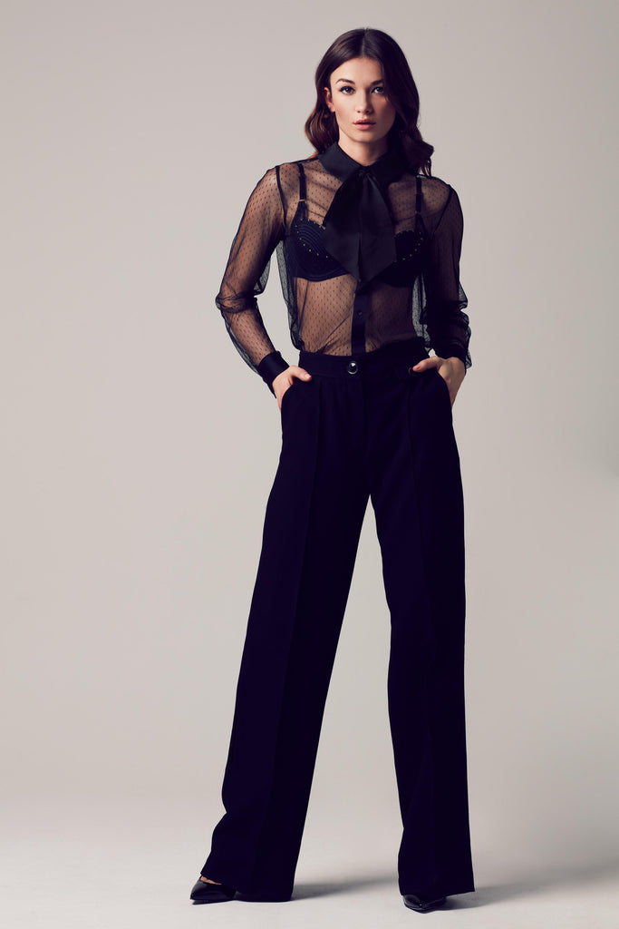 Nico black blouse bodysuit worn with wide leg trousers