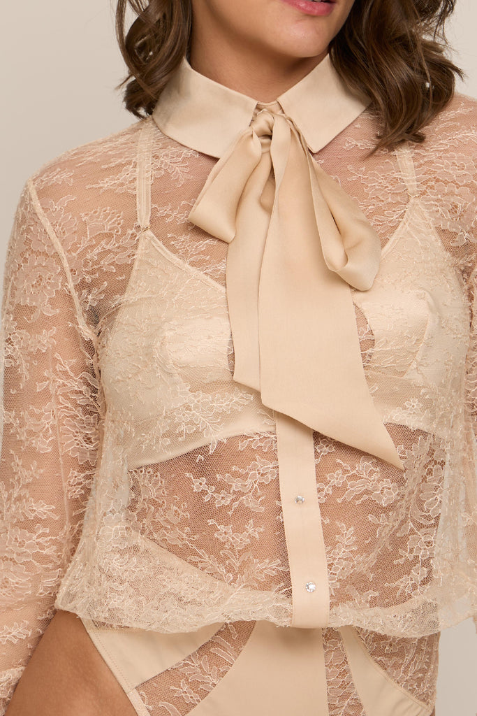 Close-up of silk pussy bow detail on Celeste oyster blush designer lace blouse bodysuit 