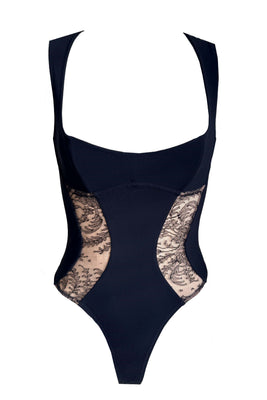 Tatu Couture Cindy designer bodysuit combining sheer black lace with sleek, sculptural panels.