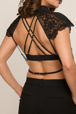 Elegant lingerie-inspired Serafina Top featuring guipure embroidery, transparent silk chiffon, and a modern open-back silhouette