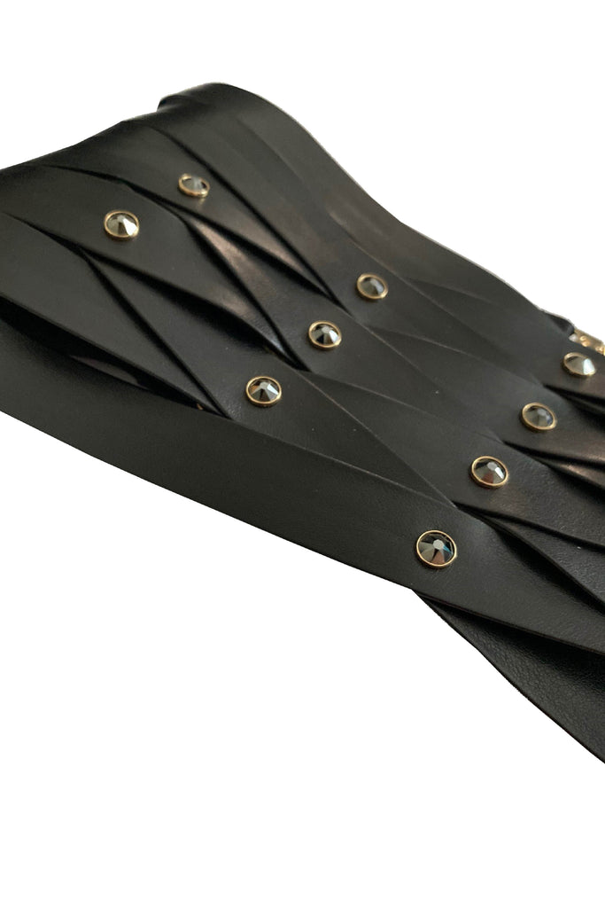 Designer corset belt crafted from vegan leather and Swarovski rivet crystals
