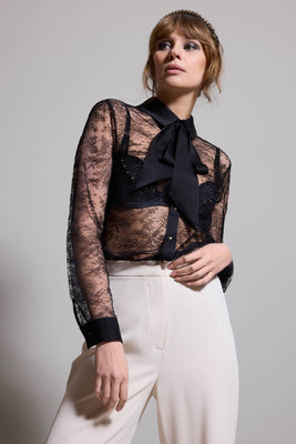 Melania luxury lace bodysuit blouse styled as outerwear with ivory trousers
