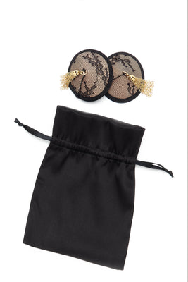 Luxury lingerie accessories featuring  black lace nipple pasties and gift bag